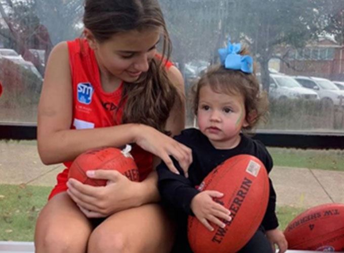 Eve and Willow at footy practice