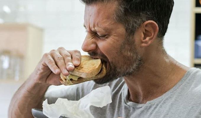 Sam eating a sandwich - carbs arent the enemy